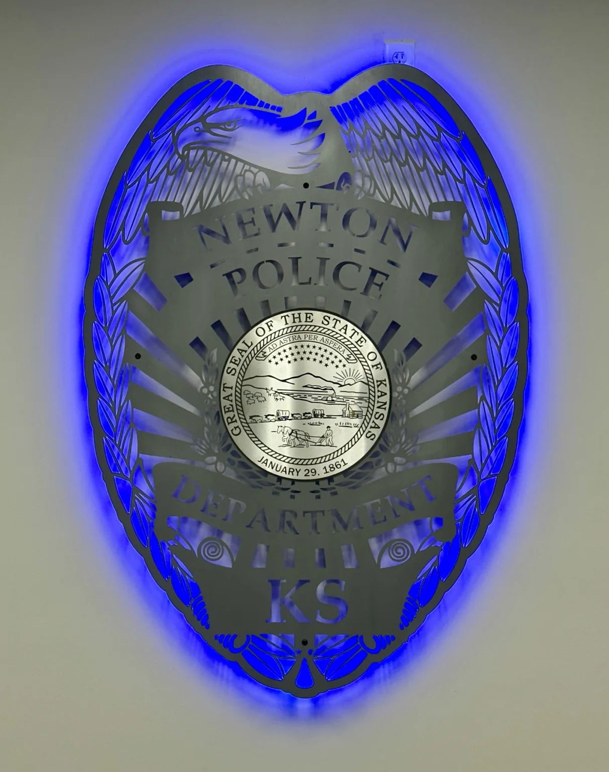 Newton Police Department illuminated emblem